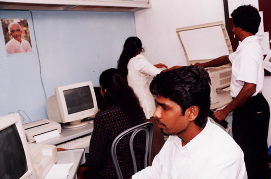 Community members using computers at a Kothmale telecentre